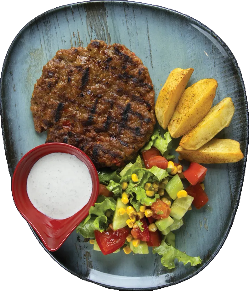 Mish në zgarë me garniturë në Be Happy Restaurant